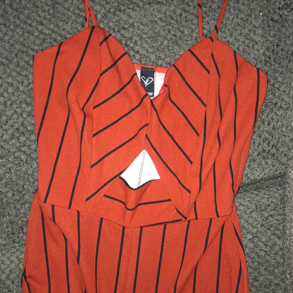 This a a jumpsuit orange womper